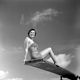 Illustration for article titled Photographers Love a Pretty Woman on a Diving Board